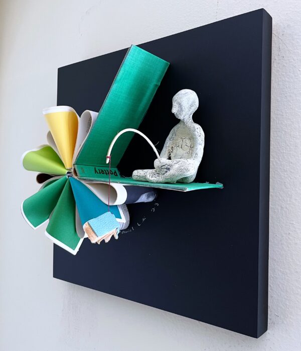 book and clay sculpture, 3d art, mixed media